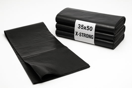 35x50 X-Strong Black garbage bags shown as folded stack with one partially unfolded